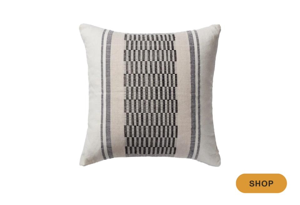 Scandinavian-inspired pillow in linen with gray stripes and geometric dot pattern