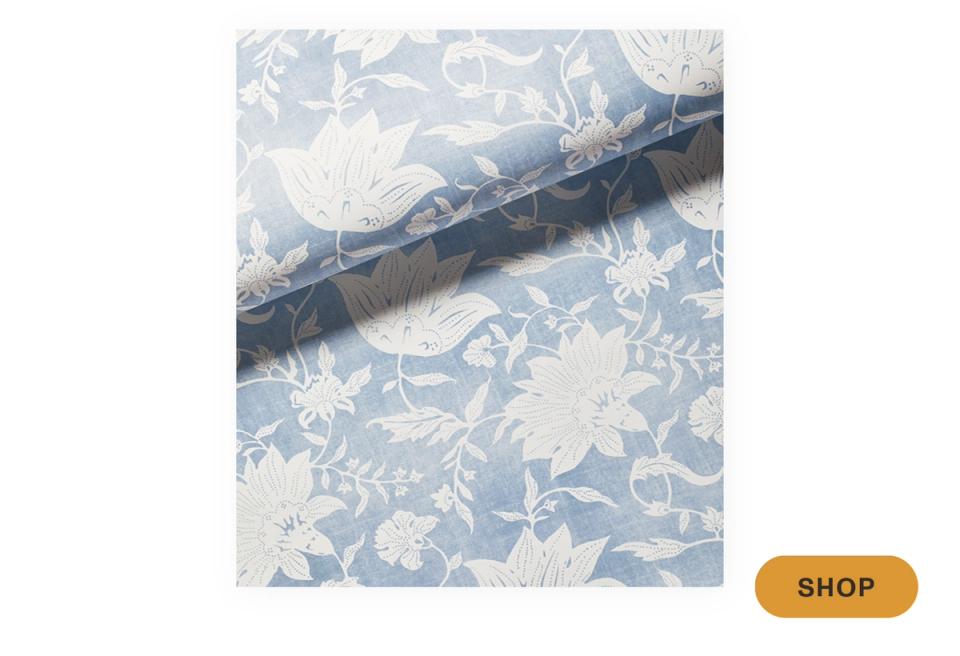 Serene blue and cream botanical floral fabric with delicate leaf print design