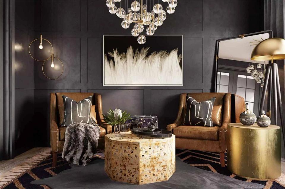 Glamorous lounge with cognac leather chairs, gold accents, and crystalline chandelier
