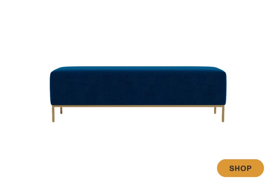 Luxe velvet bench in rich navy with brass-finished metal legs and contemporary appeal