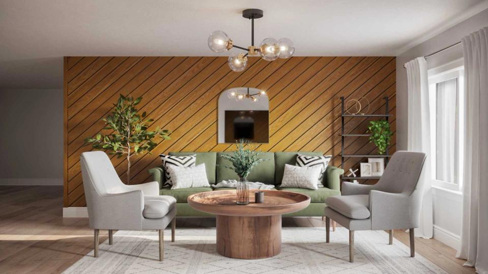 Mid-century living room with herringbone wood wall, sage accents, and warm wooden furnishings.
