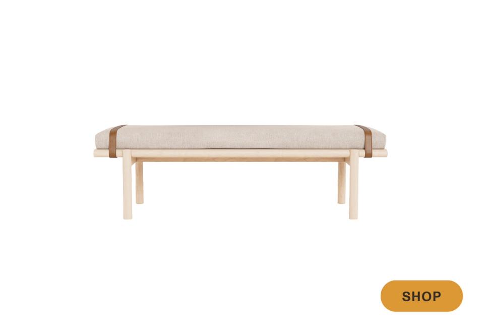 Scandinavian-inspired light wood bench with natural linen seat and tapered legs