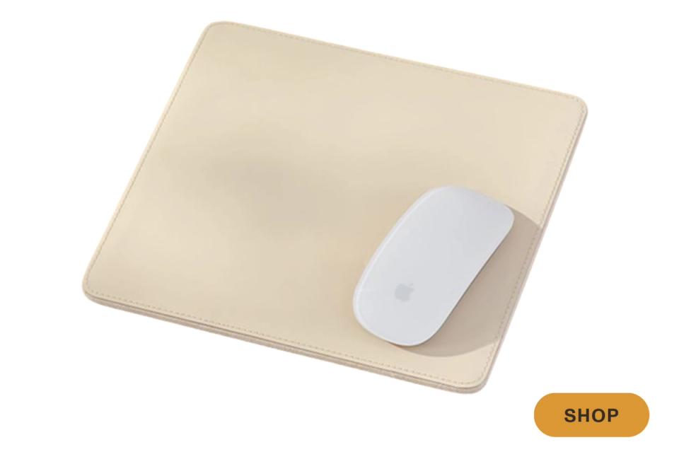 Minimalist beige leather mousepad with soft neutral tones for refined workspace