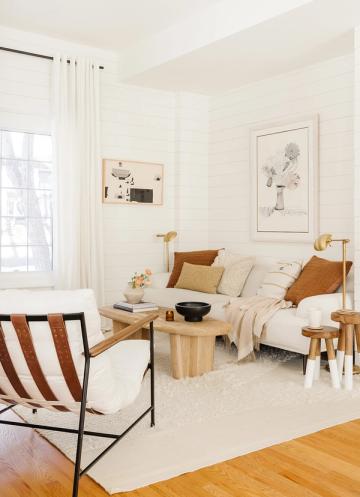 Bright modern bedroom with horizontal shiplap, warm wood furniture, and cozy minimalist Scandinavian style