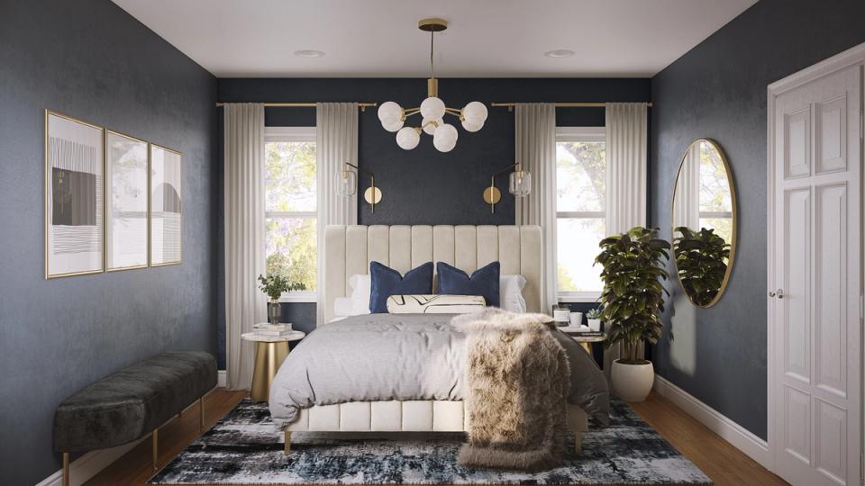 Modern bedroom with charcoal blue walls, white bedding, brass pendant lighting, and botanical accents