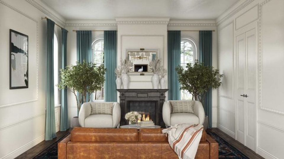 Symmetrical traditional space with teal drapery, black fireplace, cream seating, and refined classic furnishings