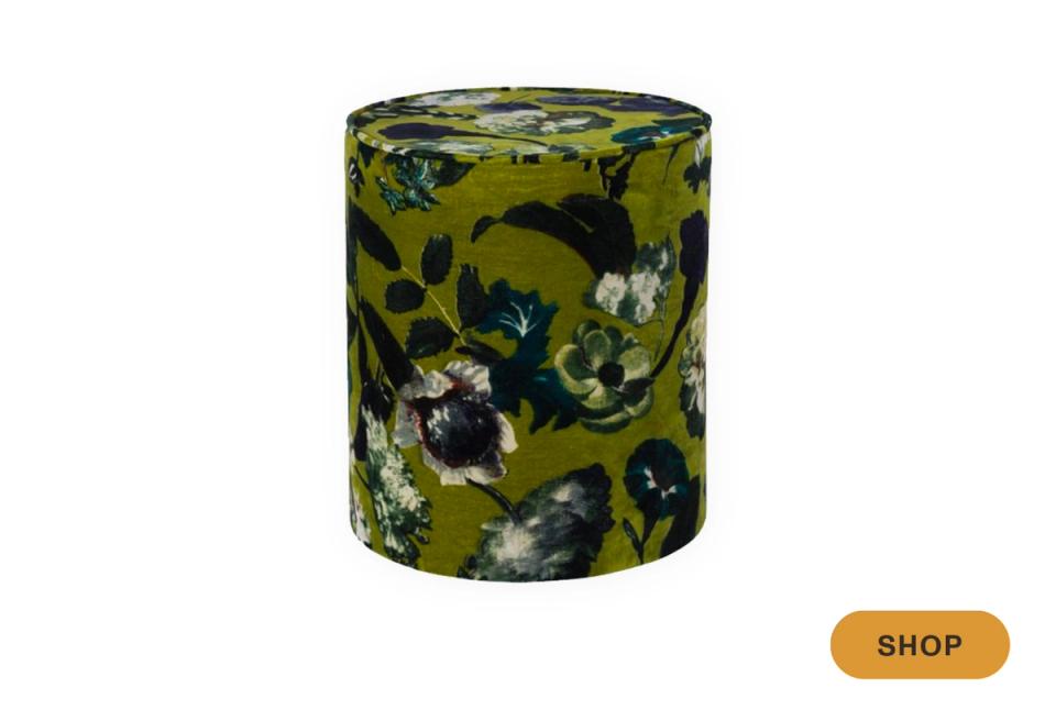 Bold chartreuse ottoman with dark floral and botanical print pattern