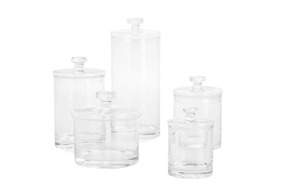 Luxury clear glass storage jars with modern, spa-like aesthetic