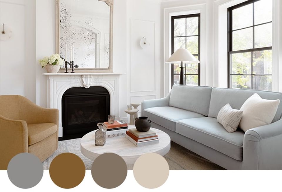 Refined minimalist living room with soft gray, mustard, and cream palette featuring fireplace focal point and streamlined furnishings.