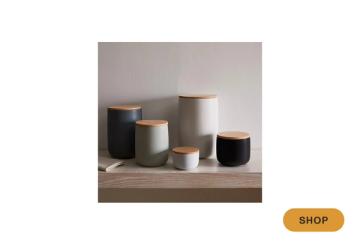Minimalist stoneware storage containers in warm and cool earth tones