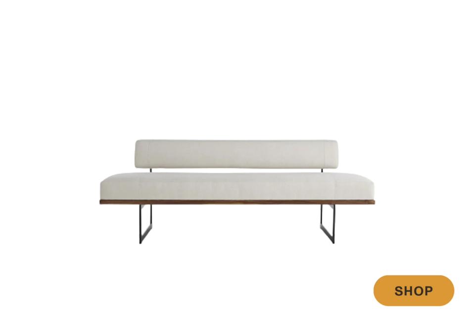 Minimalist bench with neutral cushioning, metal hairpin legs, and low-profile back
