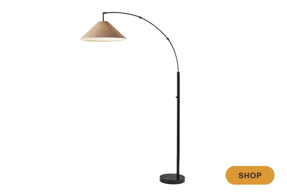 Modern arc floor lamp with bronze dome shade and sleek black metal base