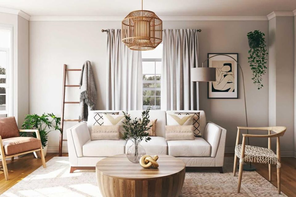 Warm minimalist living room with neutral palette, natural wood accents, linen seating, and abundant natural light