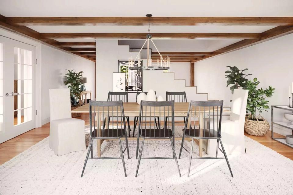 Contemporary farmhouse dining room with exposed beams, light wood table, and industrial pendant light