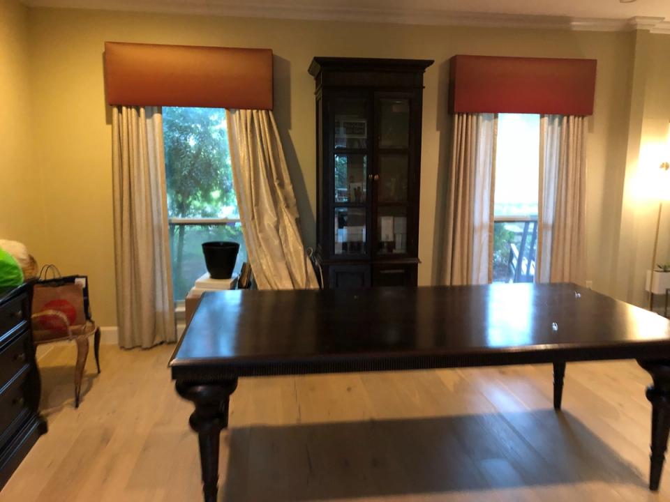 Classic transitional dining with gold tones and burgundy accents