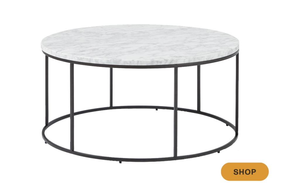 Industrial round marble coffee table with black metal geometric frame base