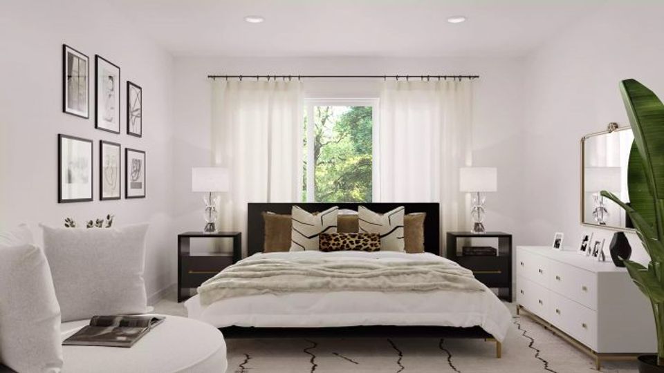 Serene modern bedroom with neutral palette, black platform bed, white bedding, and gallery wall accents
