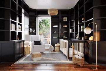 Scandinavian-inspired nursery with black built-in shelving, white ceiling, natural wood accents, and soft neutral tones creating calm sophistication