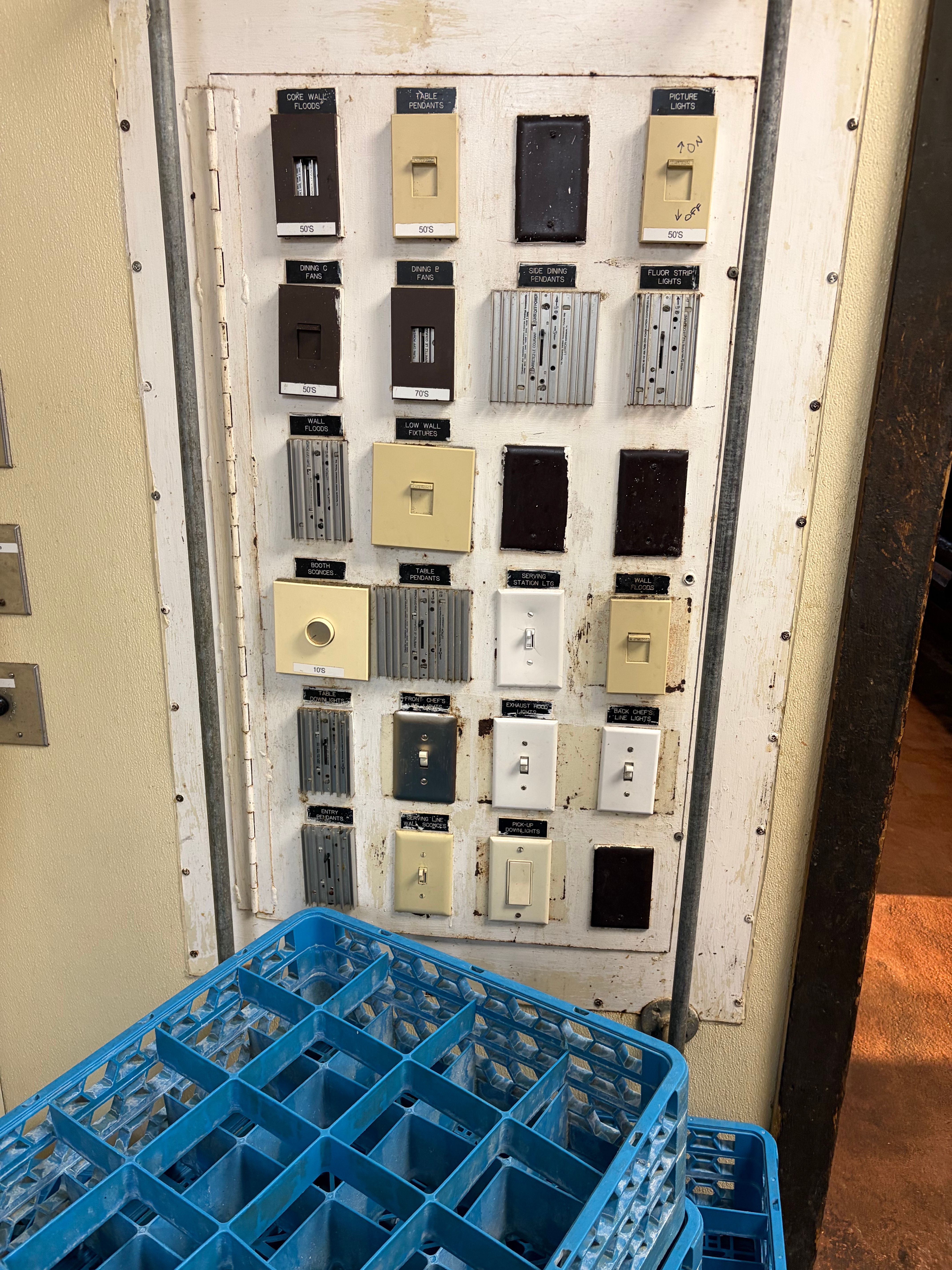 A bank of dimmers for a restaurant in a sad state.