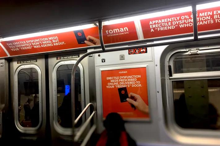 Examples of the Hims & Hers out-of-home ads inside a New York City subway car.