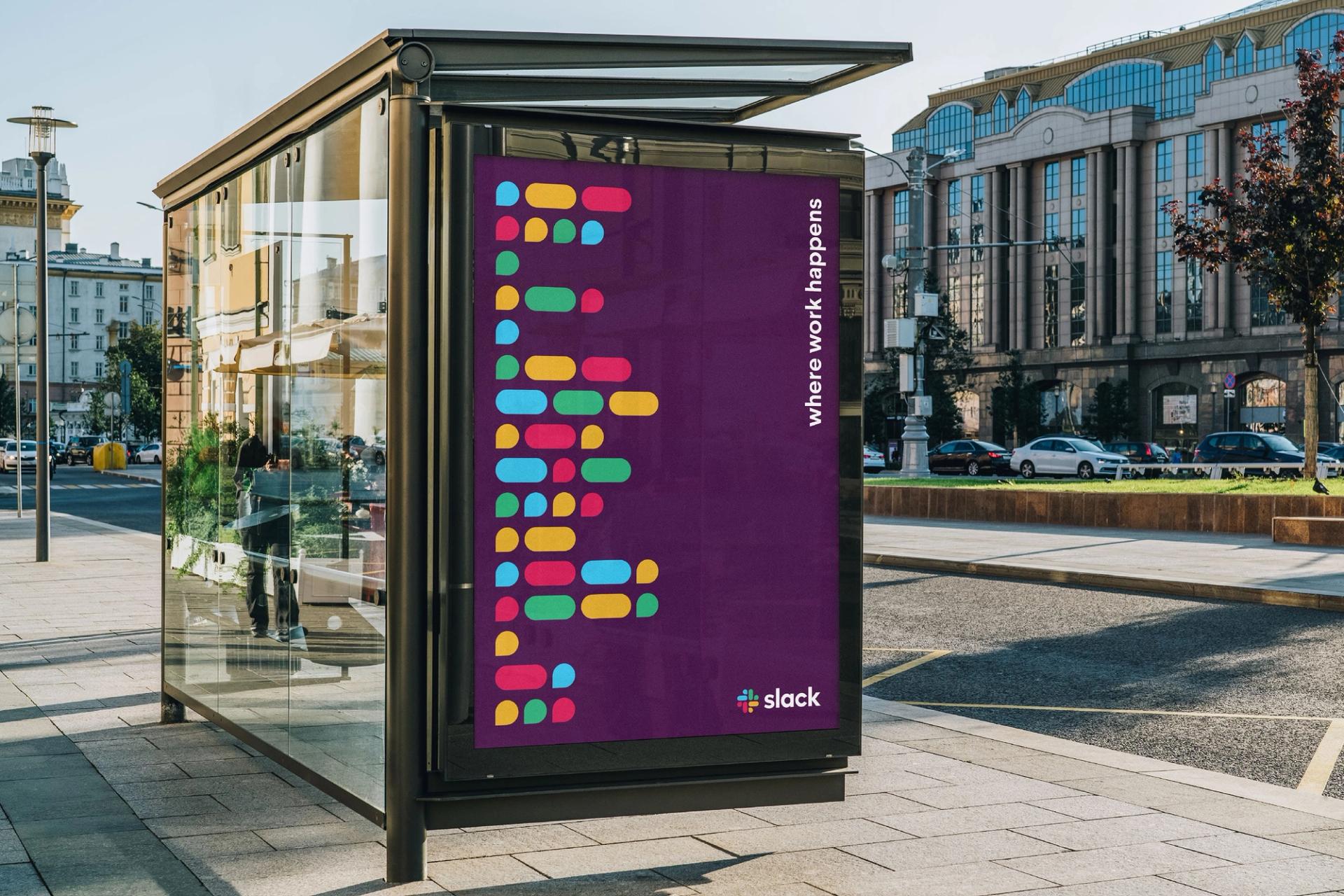 A bus shelter poster featuring the signature Slack colors and branding.