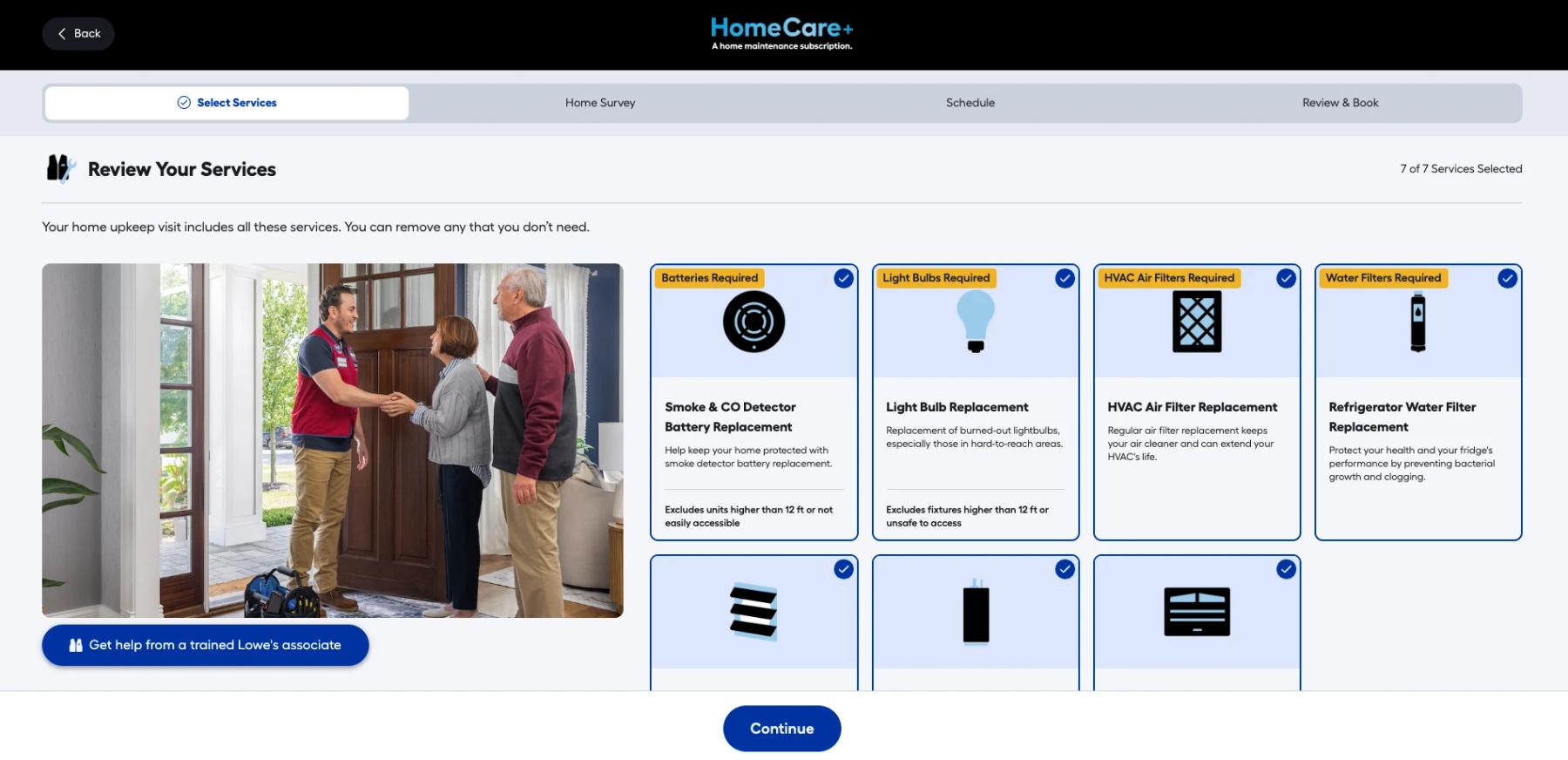 HomeCare+ enrollment, Review Your Services: seven services selected as cards with a checkmark on each, from smoke and CO detector batteries to refrigerator water filters, beside a photograph of an associate greeting a couple at their door.