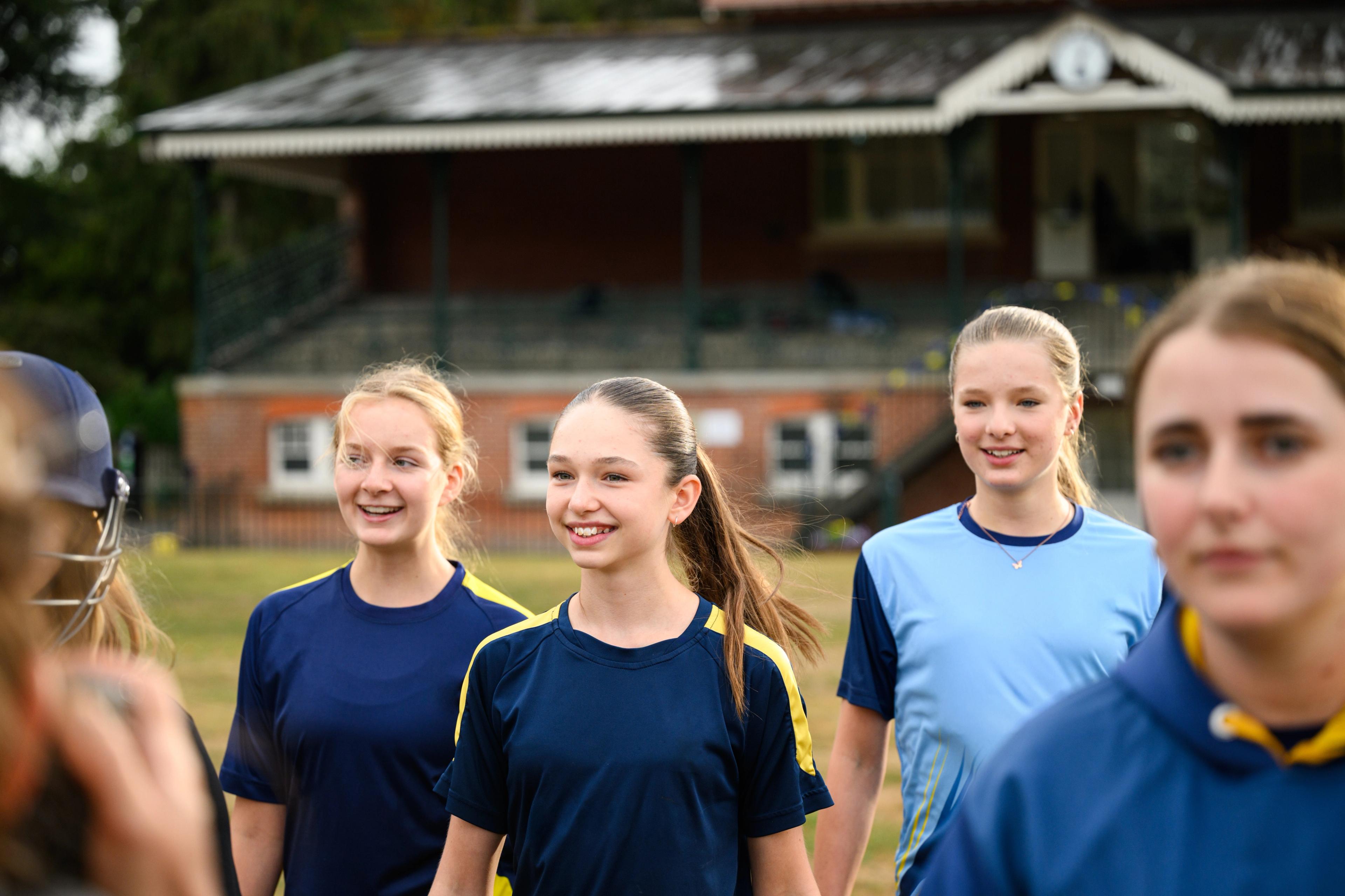 Teen girls participating confidently in sport, with a positive body image