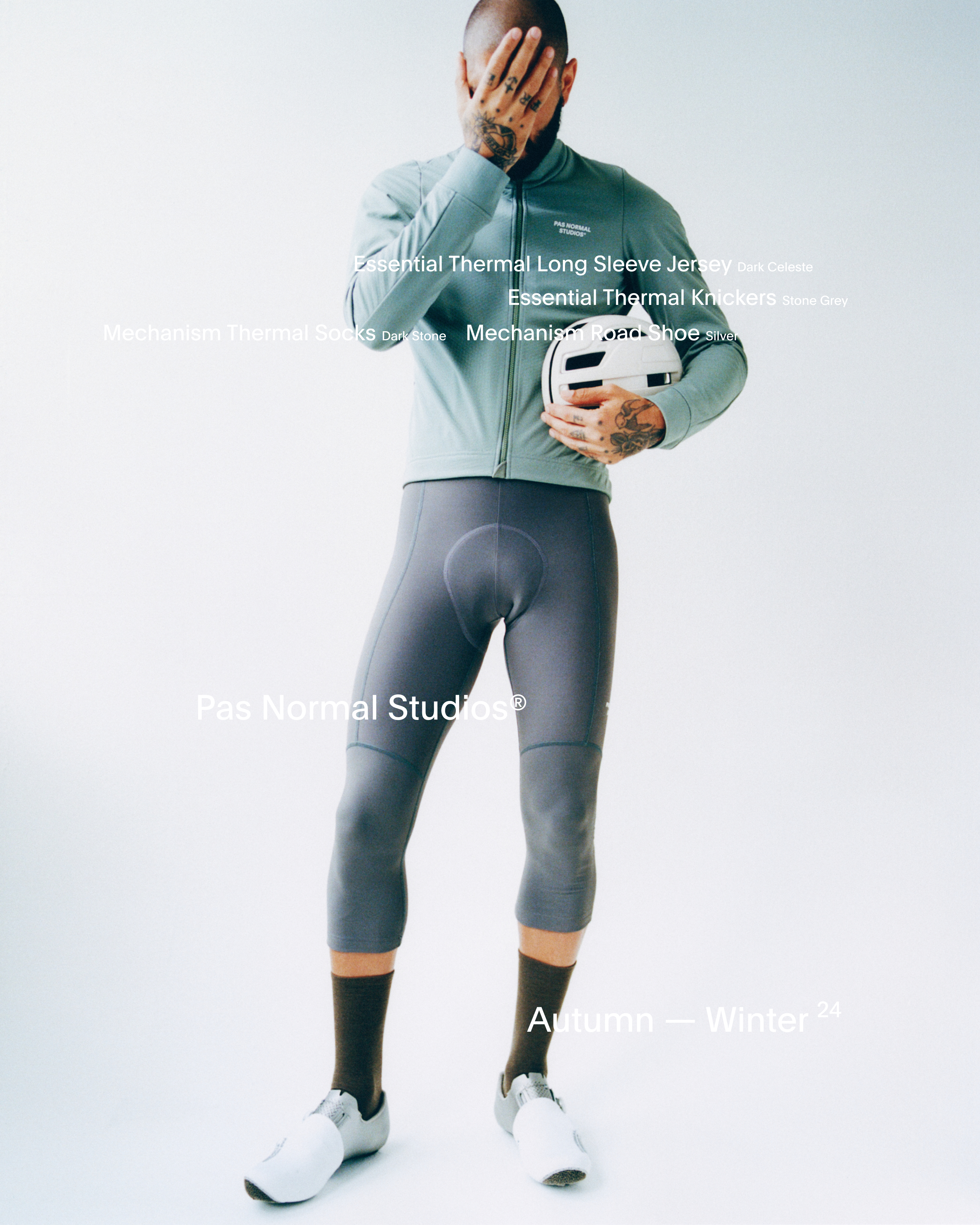 Model wearing Men's Essential Thermal Long Sleeve Jersey in light blue and Essential Thermal Knickers in grey