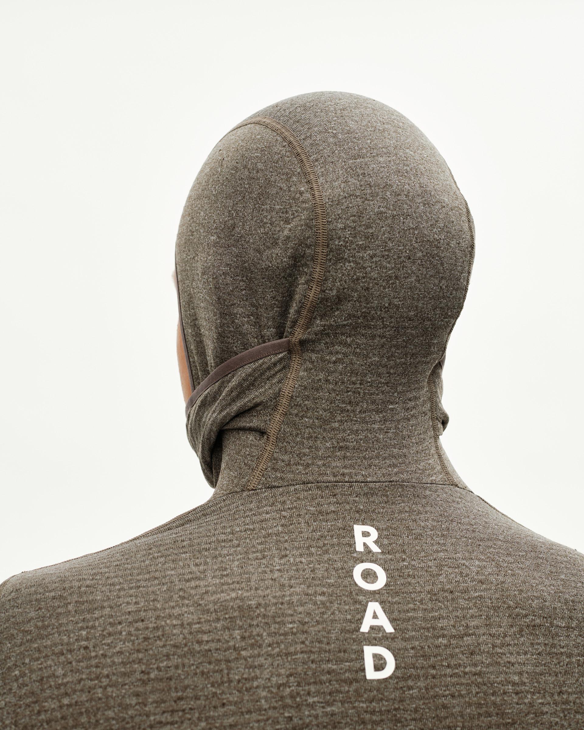 Dark Coffee brown cycling baselayer with hood, rear detail on model with white ROAD back print