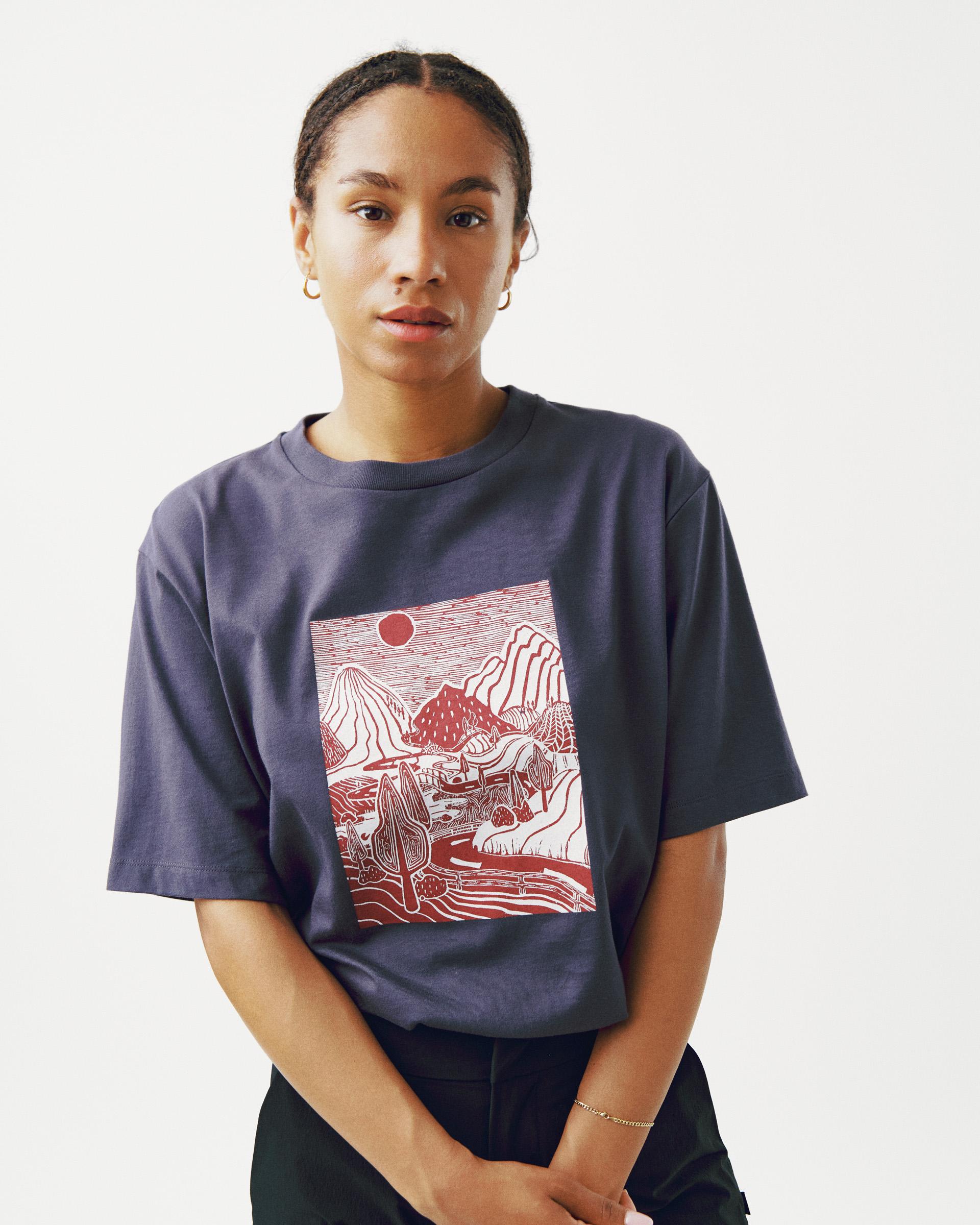 Steel Off-Race Graphic t-shirt on model with red landscape chest print