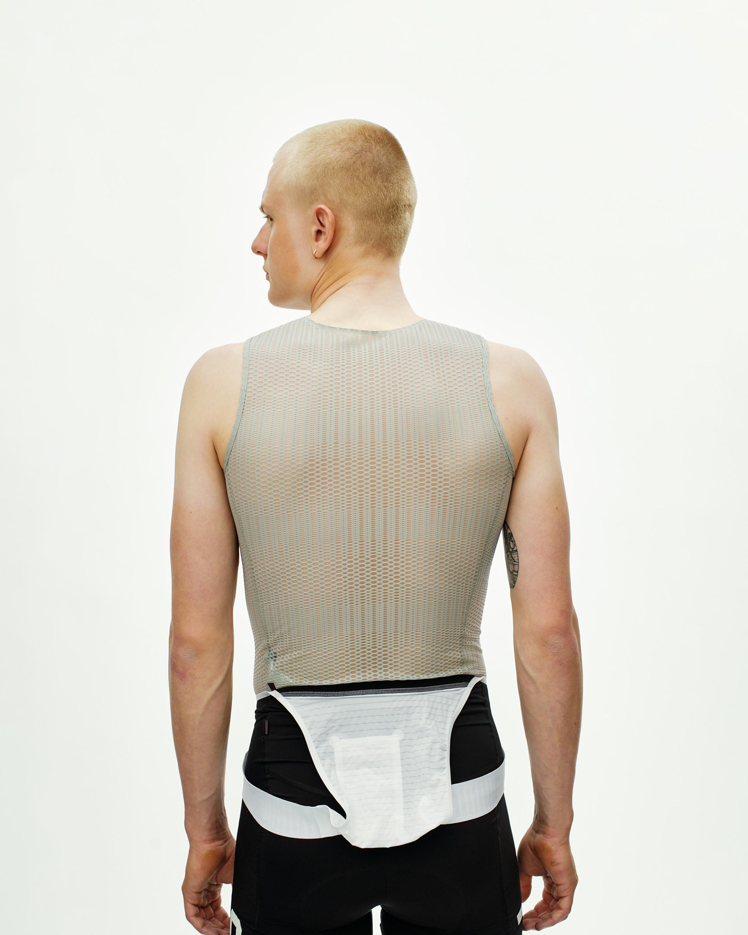 Light Grey PAS Mechanism Pro Sleeveless baselayer, rear view on model with mesh construction