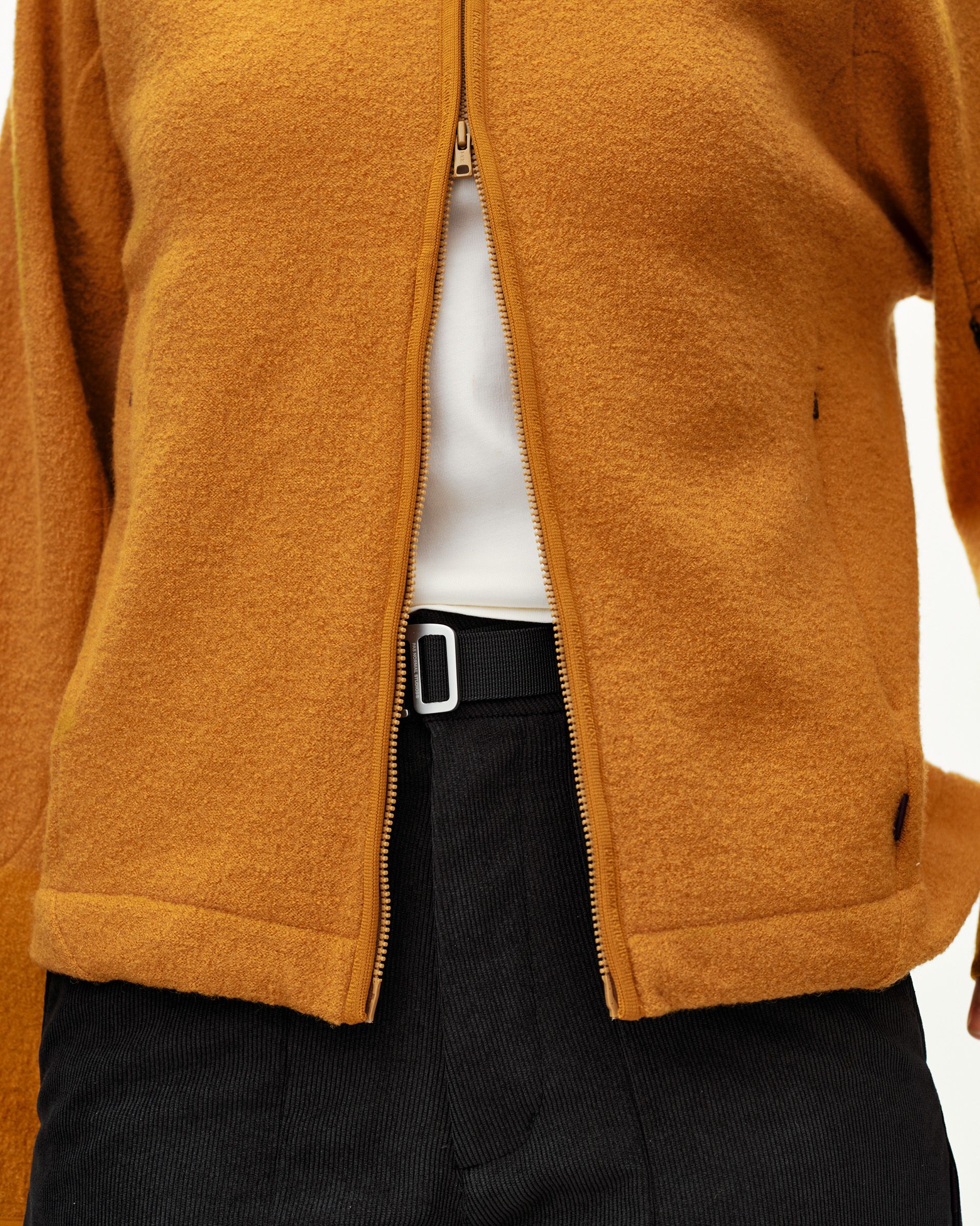 Ochre Off-Race Boiled Wool jacket, front detail on model with open full-length zip