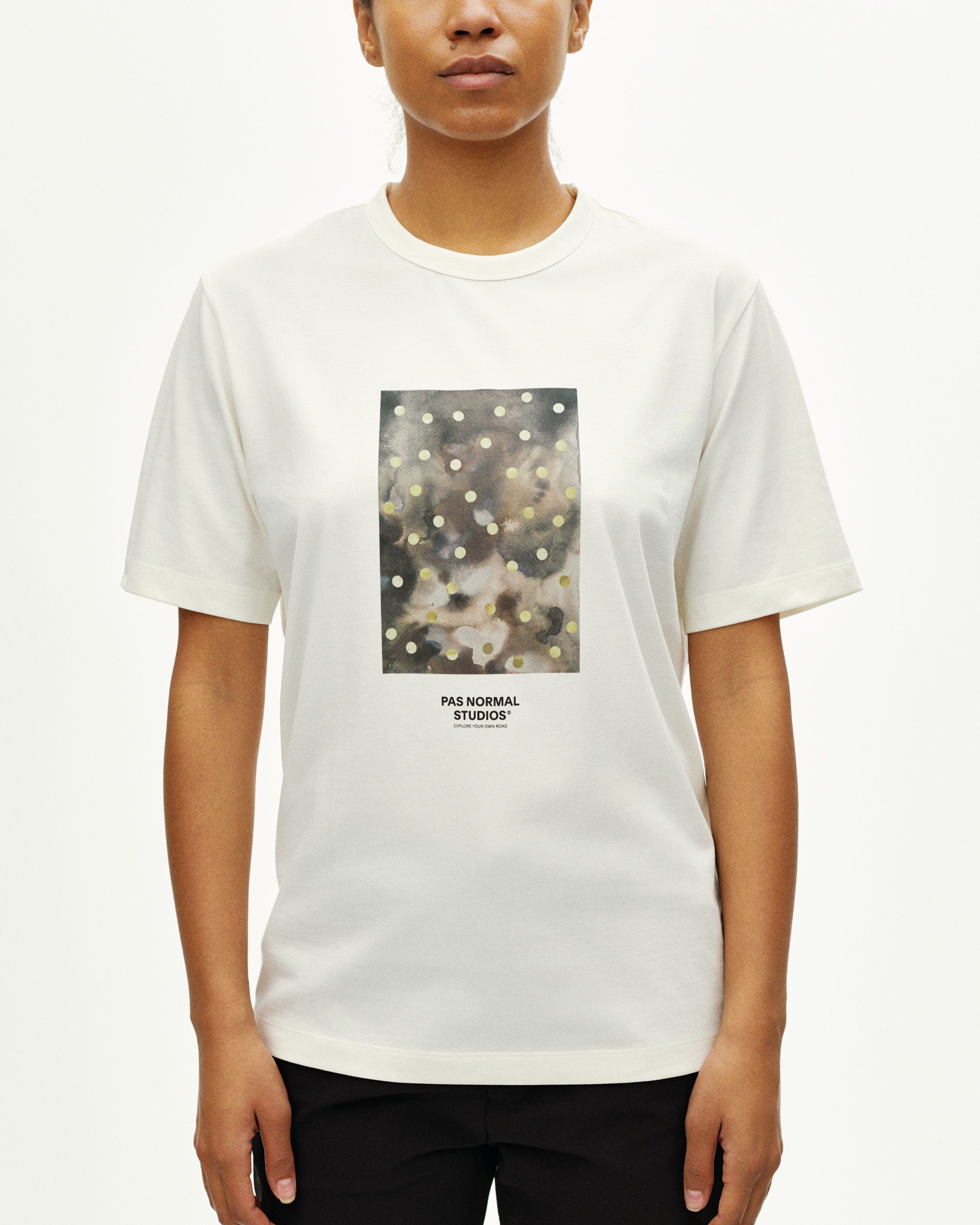 Off White Off-Race Cotton Tech Graphic t-shirt on model with camouflage dot print