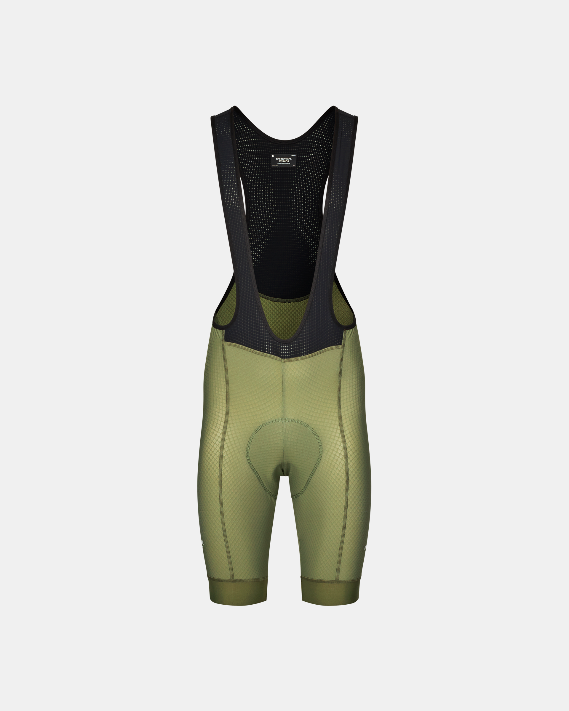 Light Olive Essential cycling bibs, front flat lay with black mesh bib and textured panels