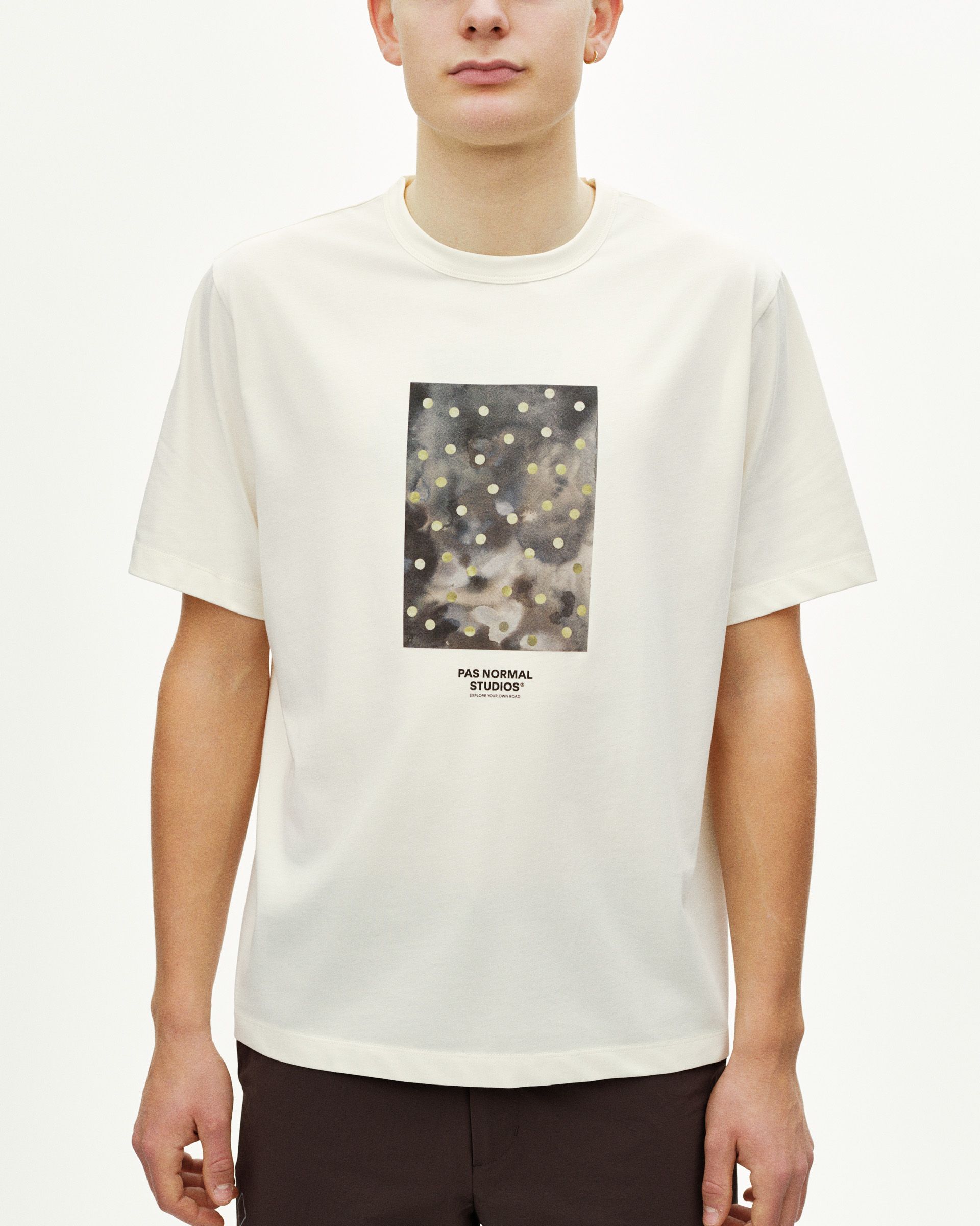 Off White Off-Race Cotton Tech Graphic t-shirt on model with abstract dotted chest print