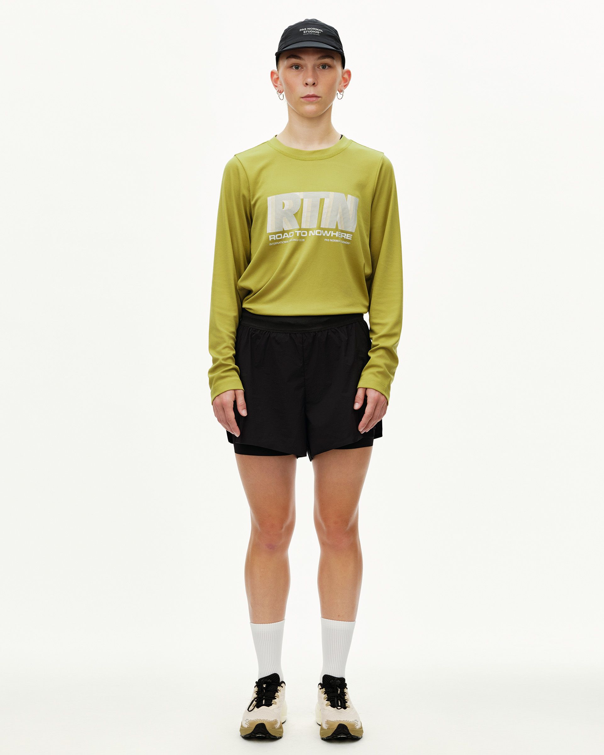 Black Balance 2-in-1 shorts on model, front view with layered inner liner visible