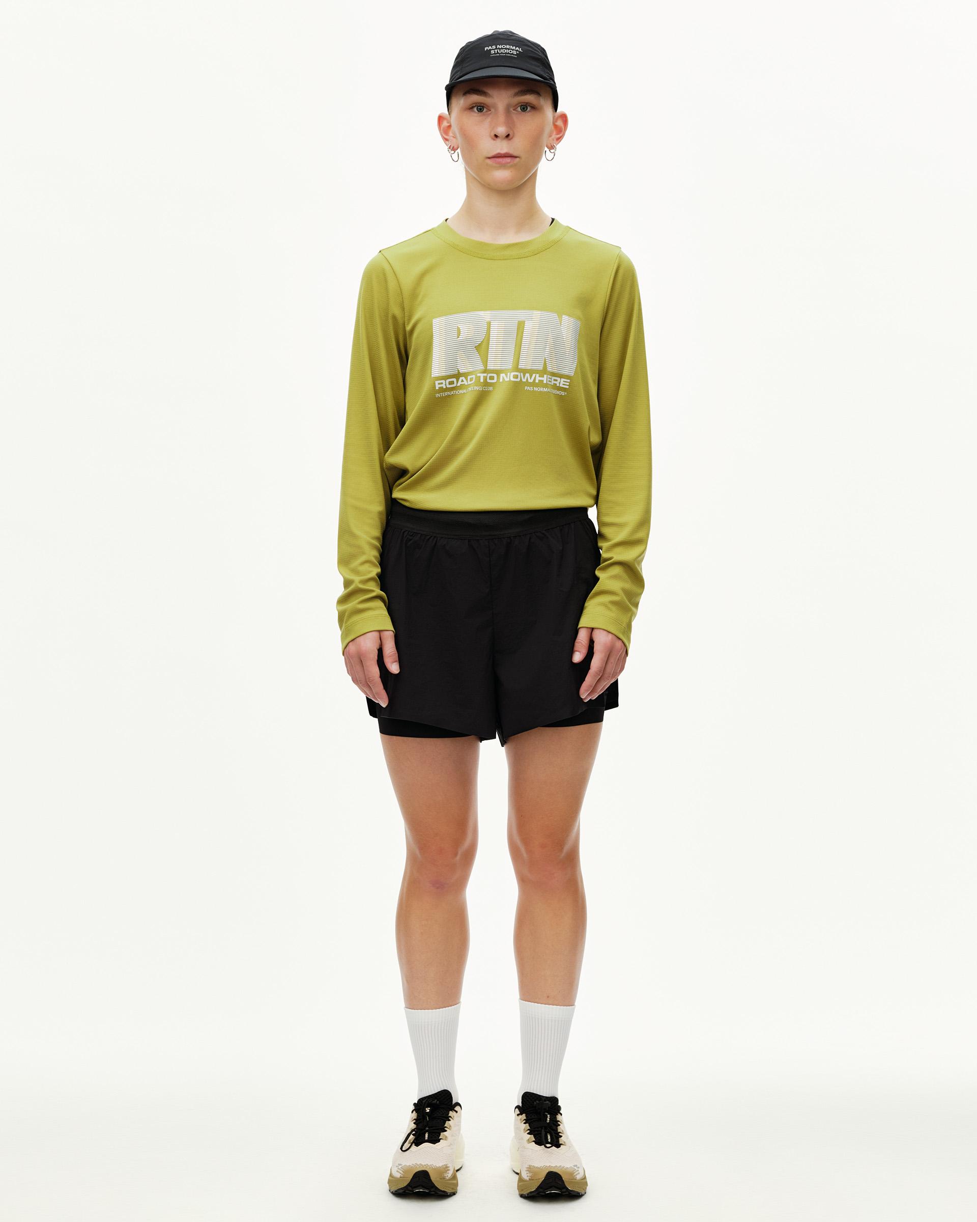 Black Balance 2-in-1 shorts on model, front view with layered inner liner visible