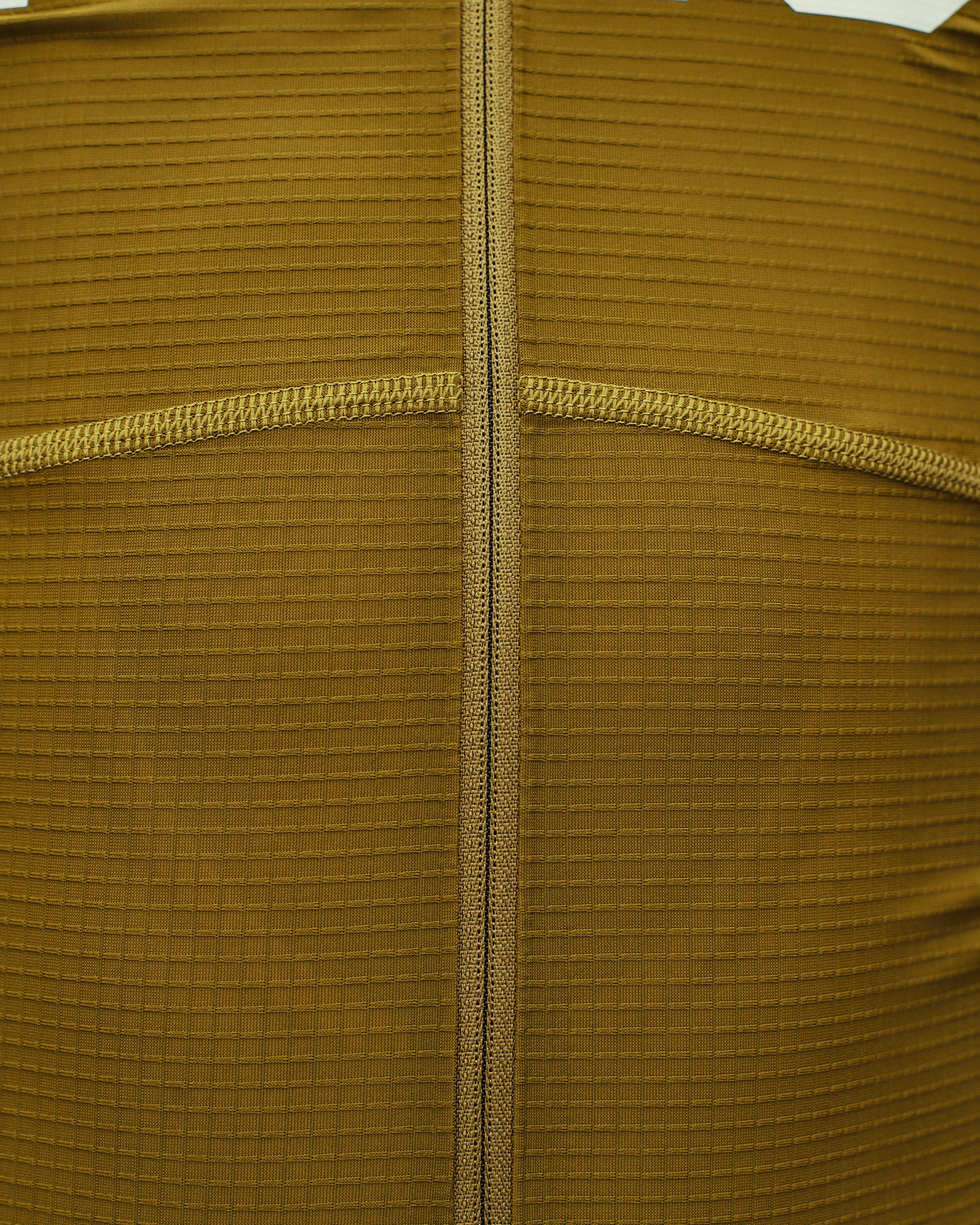 Brown PAS Mechanism Pro long sleeve cycling jersey, rear detail view with ribbed texture and flatlock seams