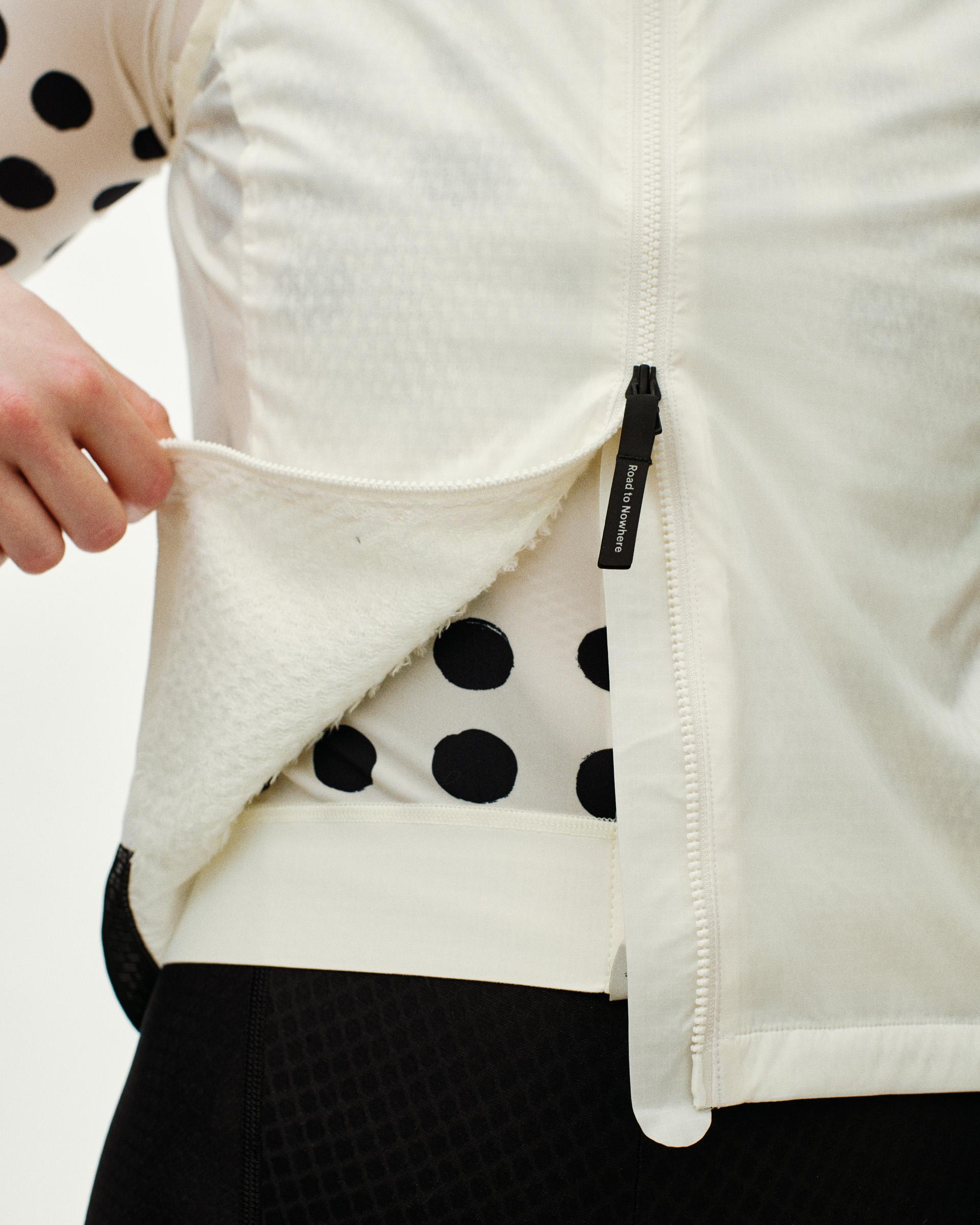 Off White Essential Insulated gilet, detail view showing polka dot lining and zip pocket