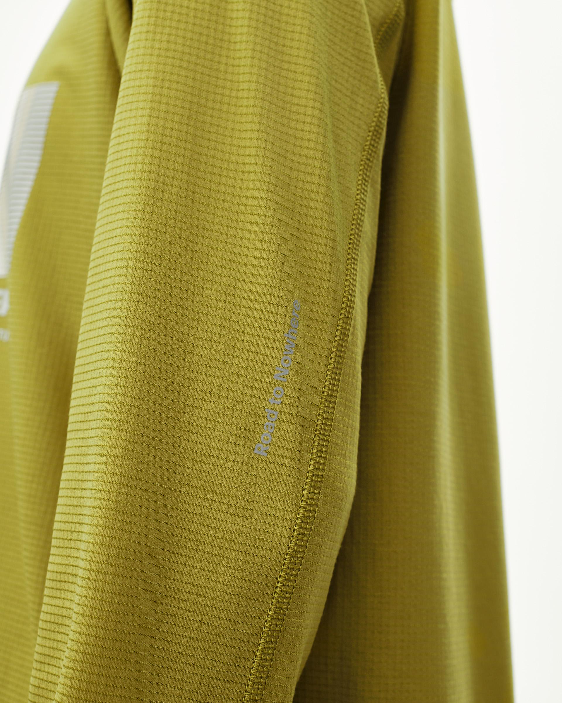 Dark Lime Balance long sleeve T-shirt, sleeve detail view with ribbed texture and contrast sleeve seam