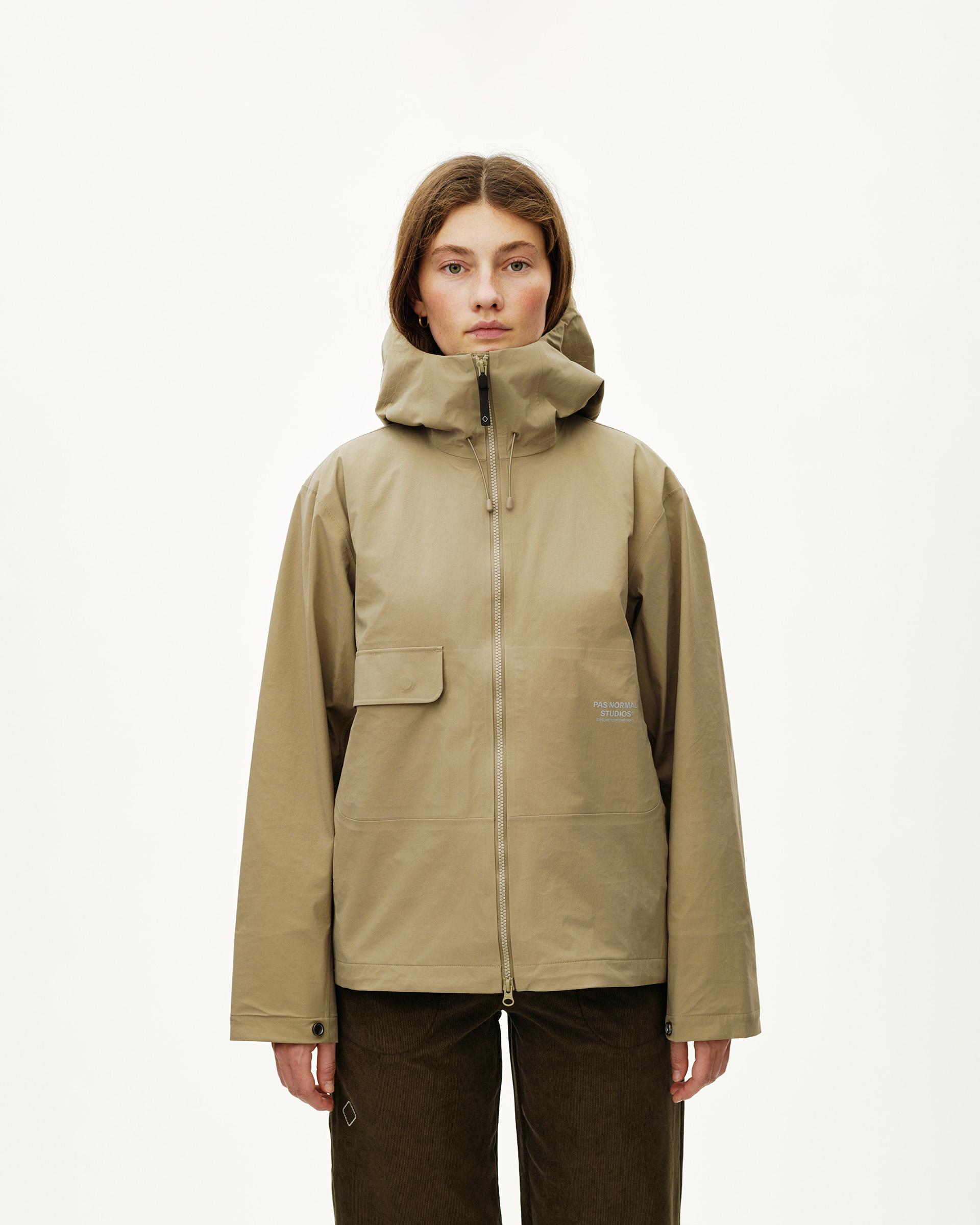 Dusty Earth khaki Off-Race 3L Shell jacket on model, front view with full zip and storm hood