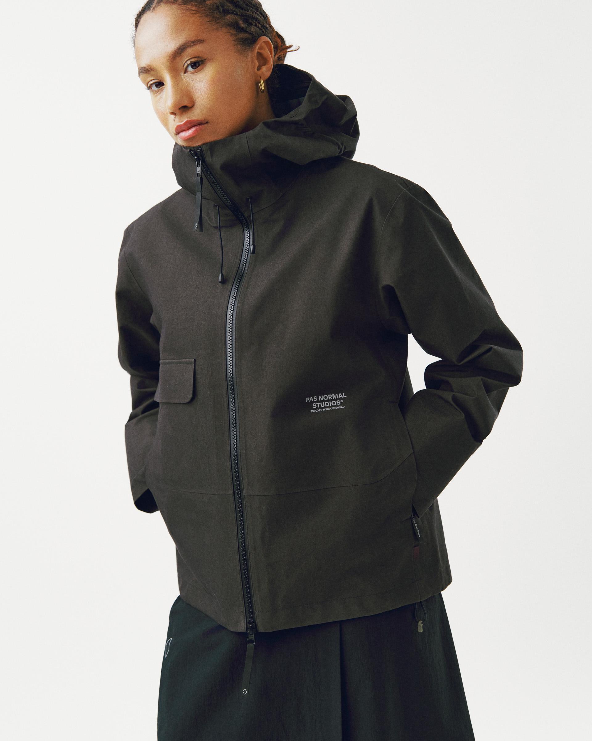 Dark Olive Off-Race 3L Cotton Shell jacket on model with hood and zip closure