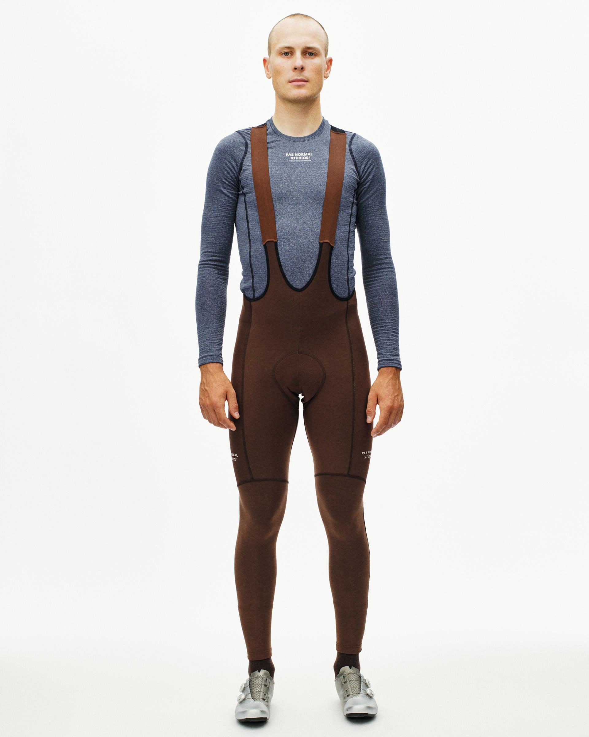 Light Brown Essential Thermal Long cycling bibs on model, front view with thermal panels