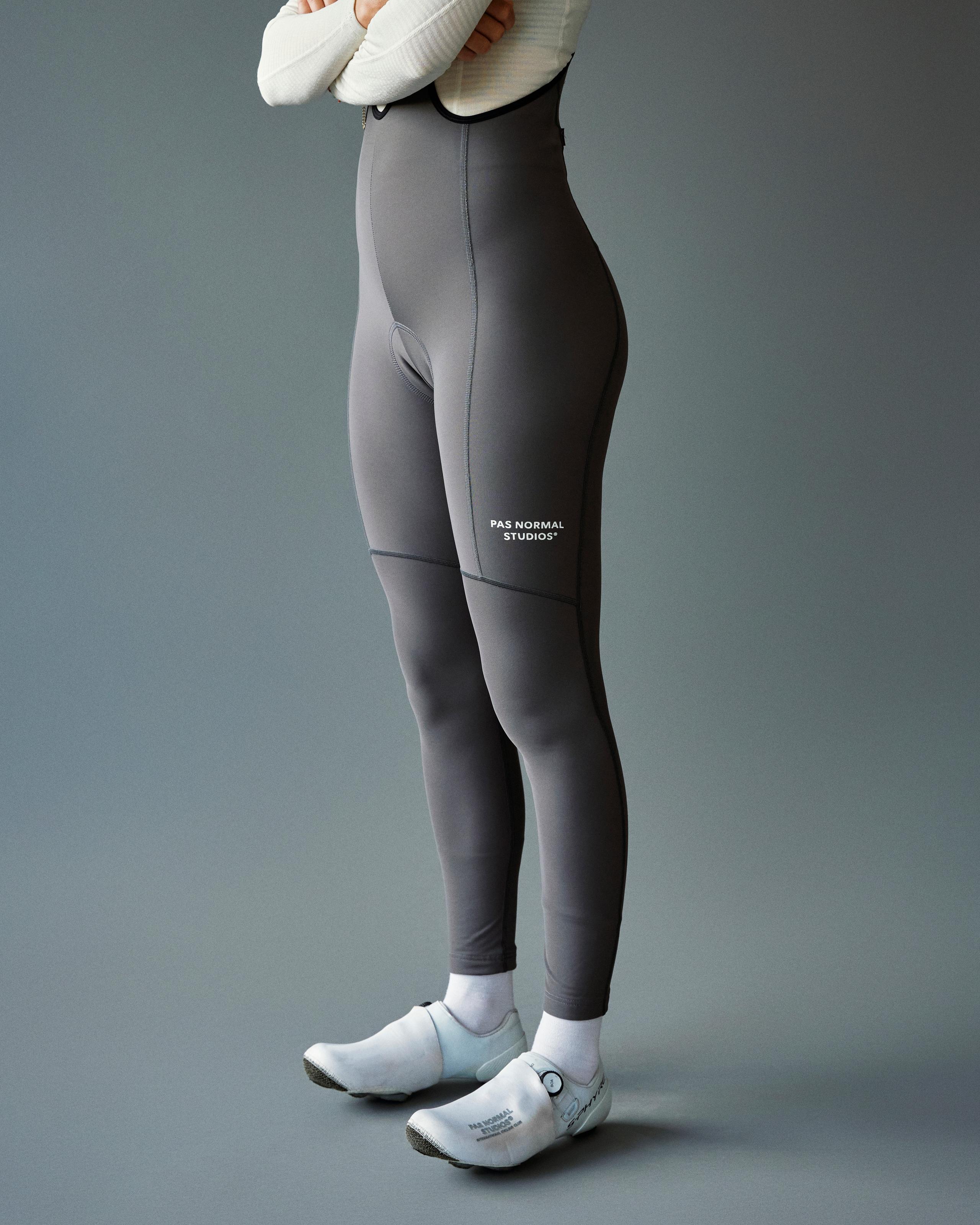 Stone Grey Essential Thermal Long cycling bibs on model with white leg text
