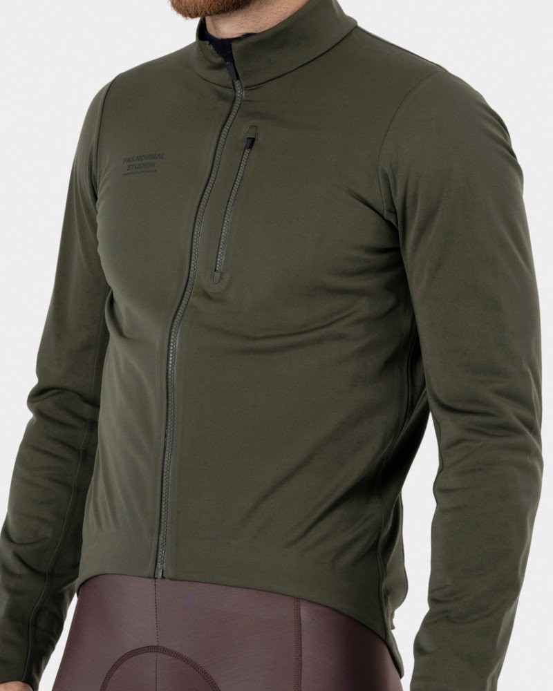 Army Green Essential Thermal jacket on model with chest zip pocket and full front zip