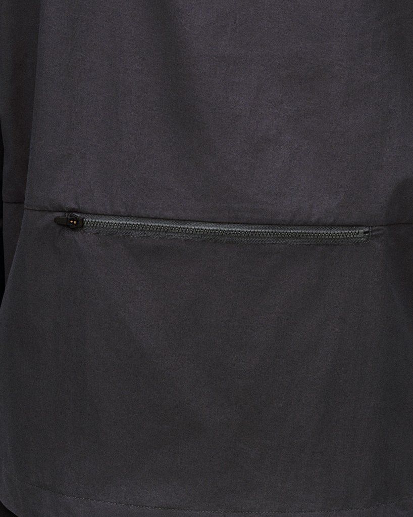 Grey Off-Race Utility jacket detail view showing horizontal chest zip pocket