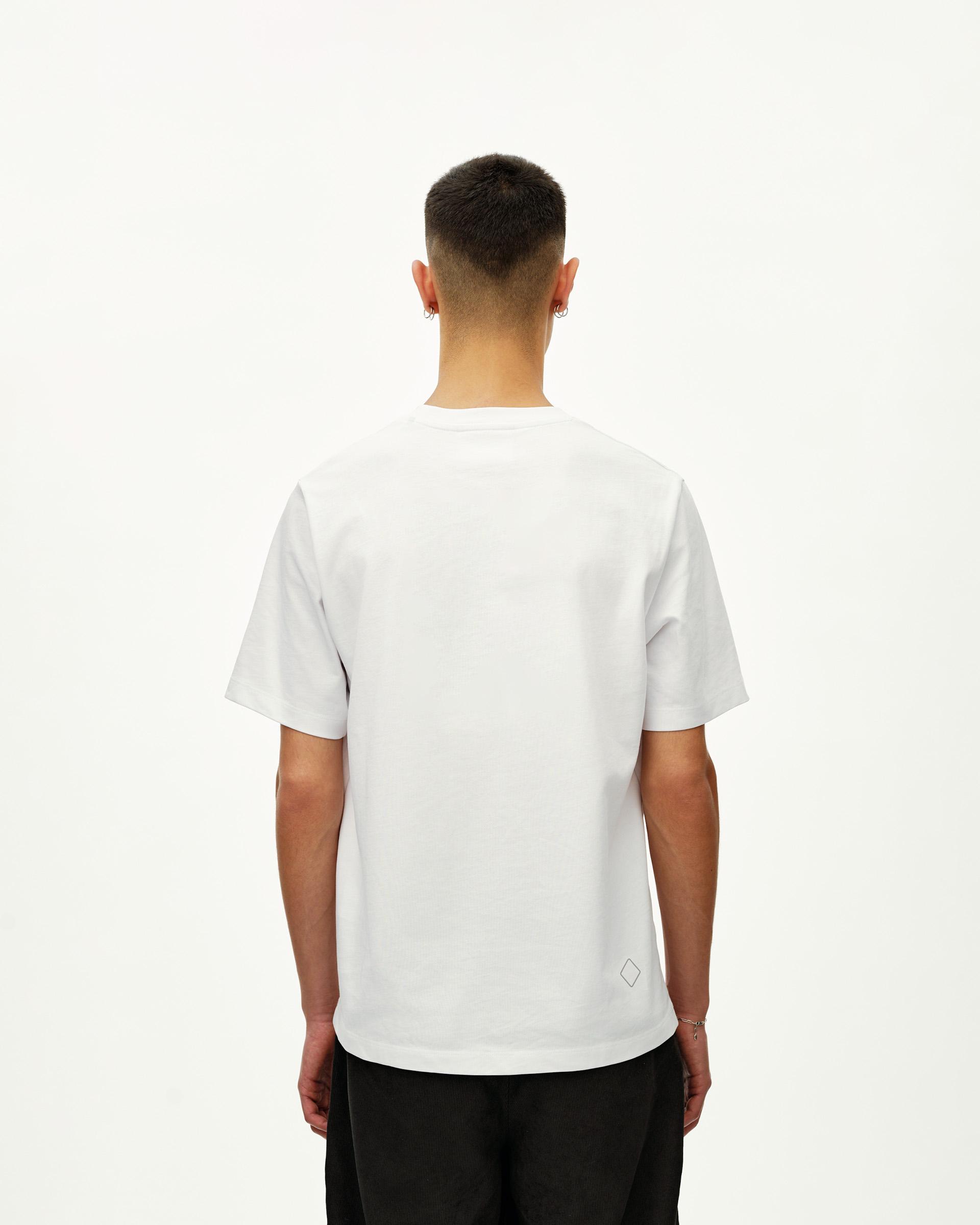 White Off-Race T-shirt on model, rear view with small diamond logo at hem