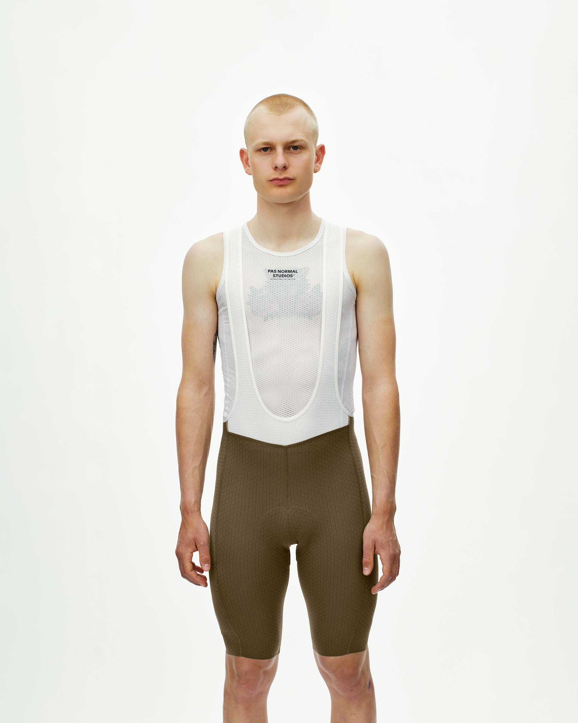 Dark Stone T.K.O. Essential Light Cargo cycling bibs on model with white mesh base layer