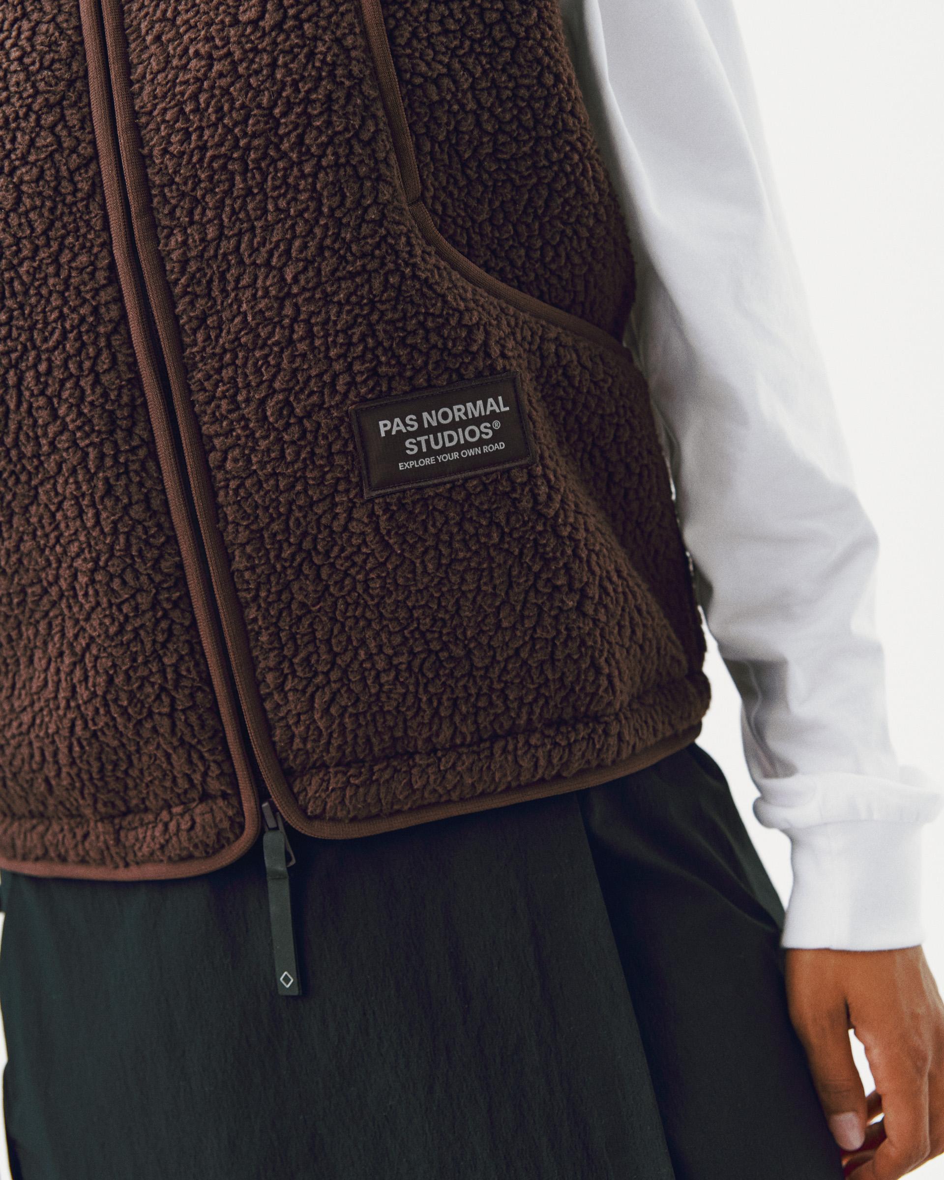 Brown Off-Race Pile Fleece jacket on model with sherpa fleece texture and chest pocket