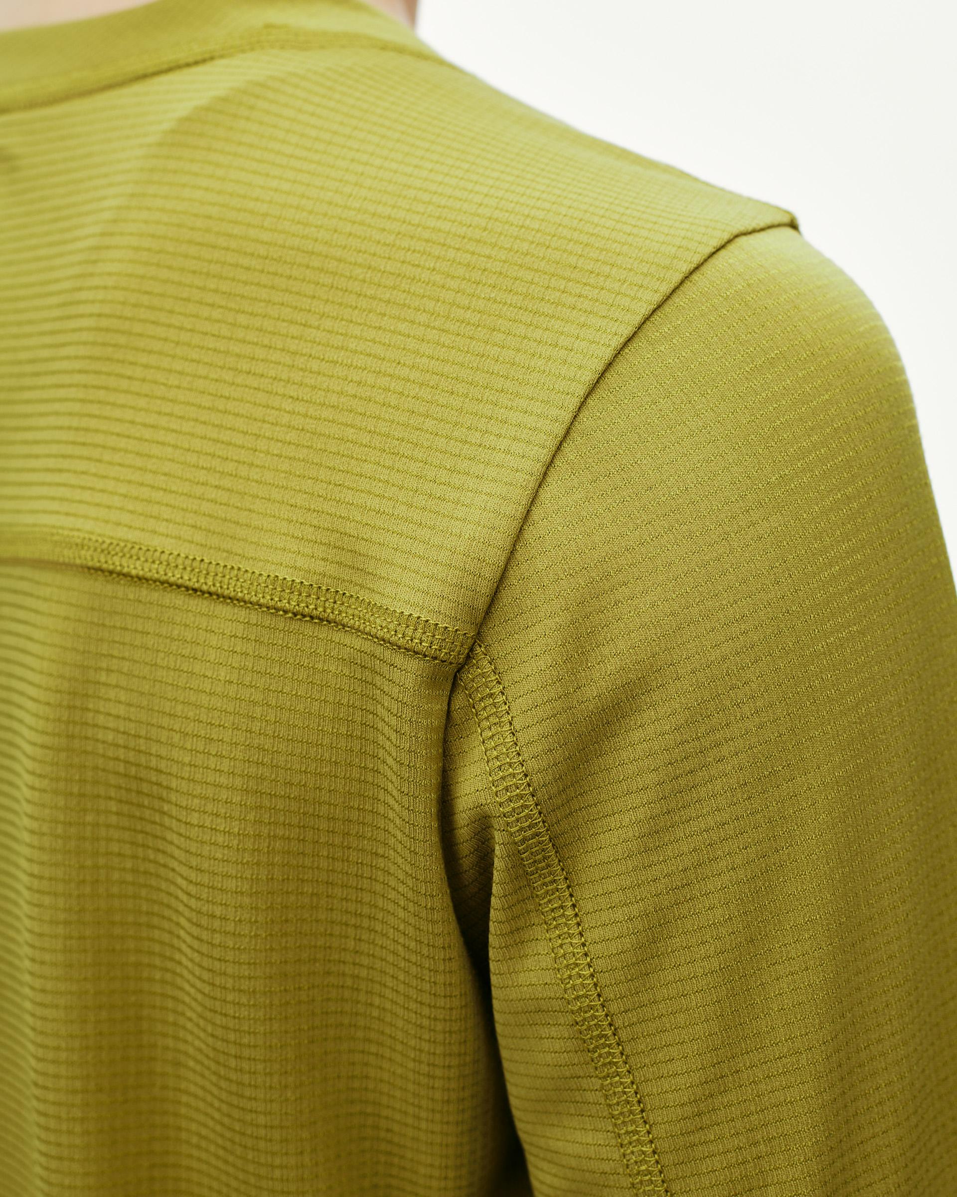 Dark Lime green Balance long sleeve T-shirt, shoulder detail on model with ribbed texture and flatlock seams